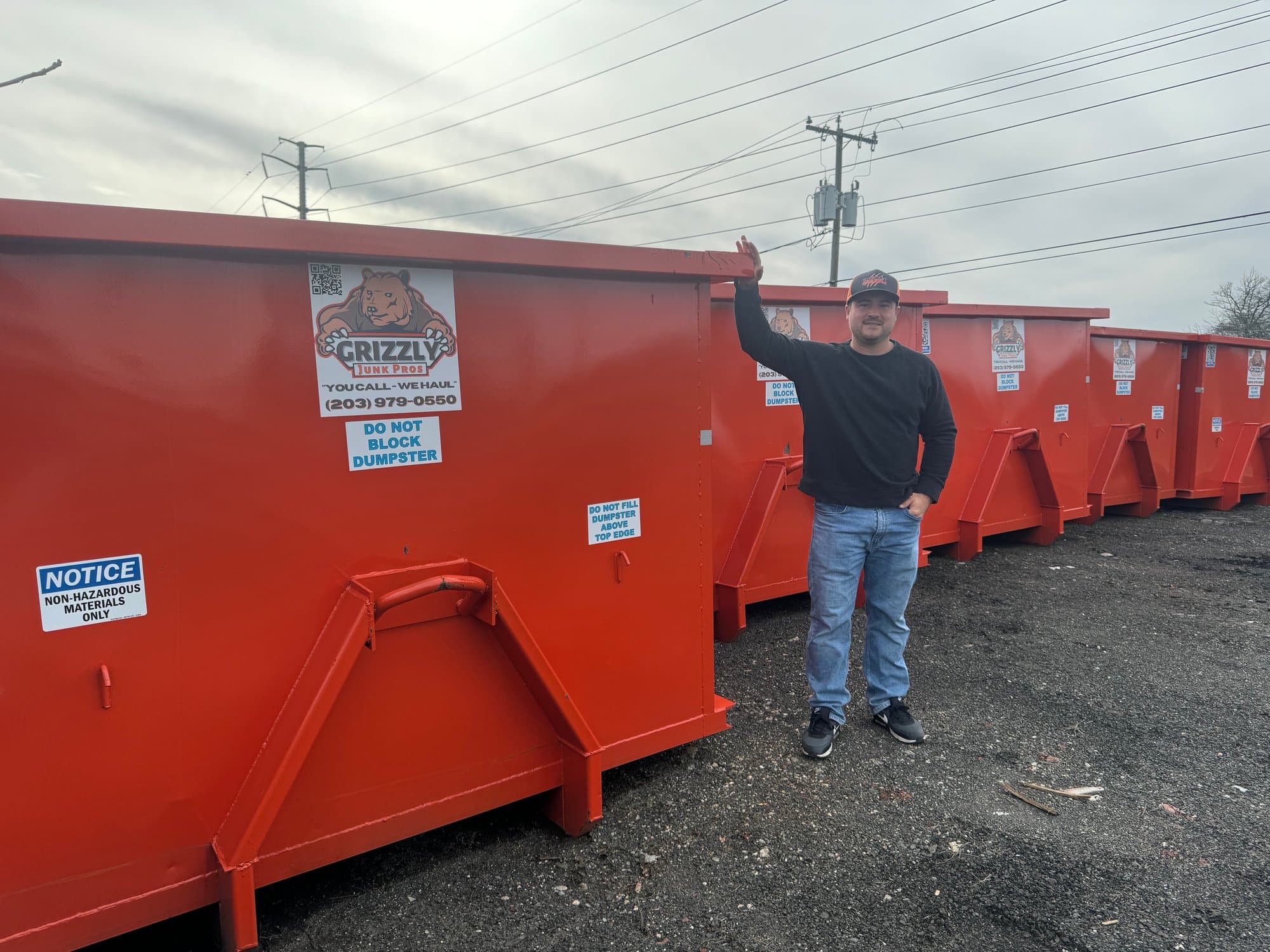 Roll-off dumpster delivered to a Connecticut driveway