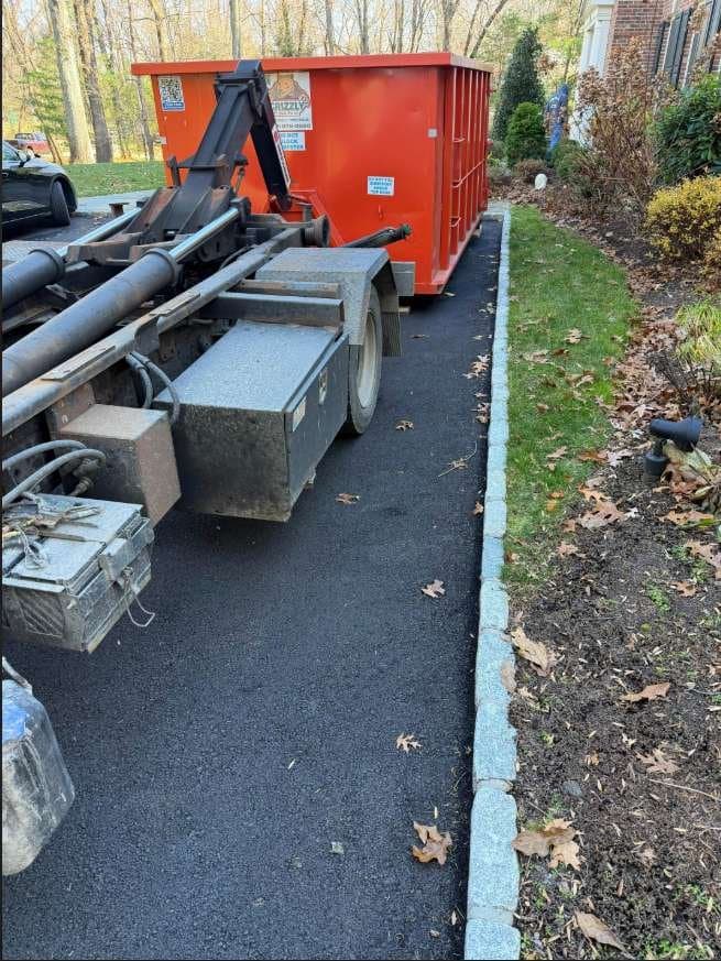 dumpster-truck-delivery in Greenwich, CT by Stamford Junk Pros