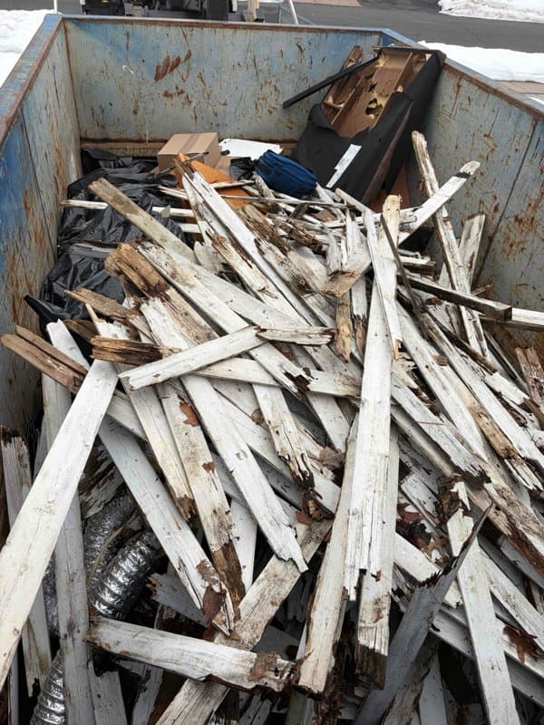 wooden-debris-dumpster in Hartford, CT by Stamford Junk Pros
