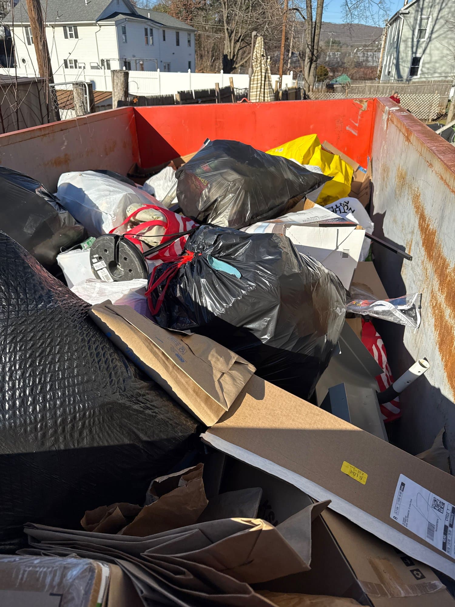 dumpster-full-junk in Torrington, CT by Stamford Junk Pros