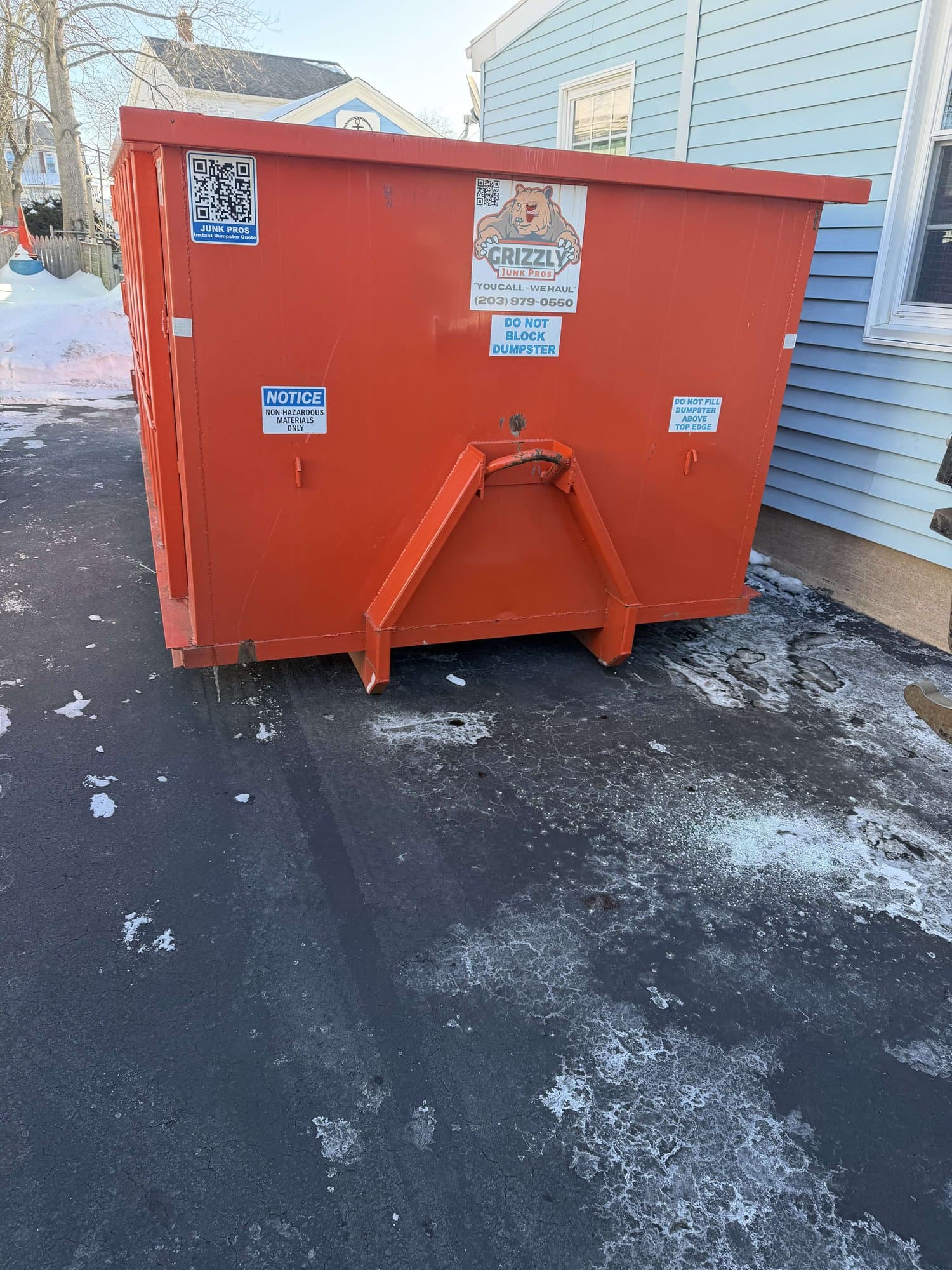 red-dumpster-placed in West Haven, CT by Stamford Junk Pros