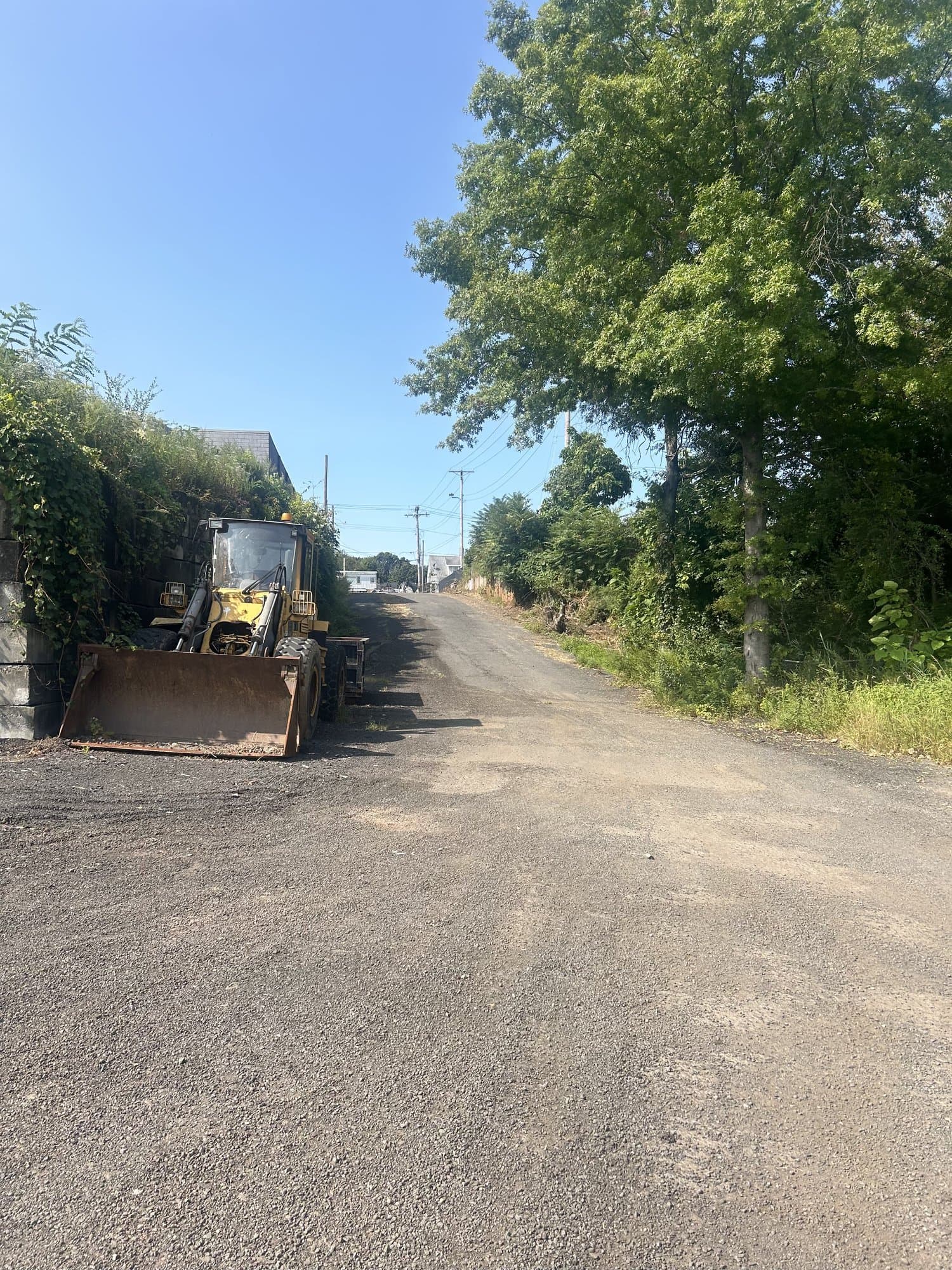 driveway-cleanup-equipment in West Haven, CT by Stamford Junk Pros