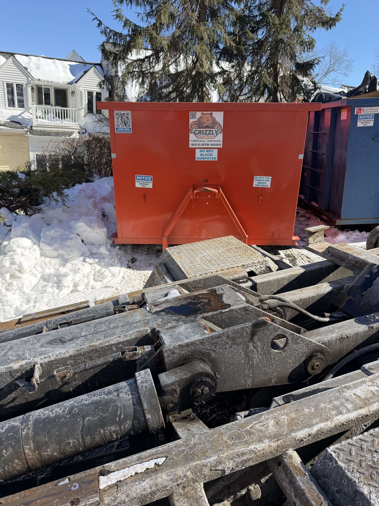 dumpster-with-metal-debris in Wilton, CT by Stamford Junk Pros